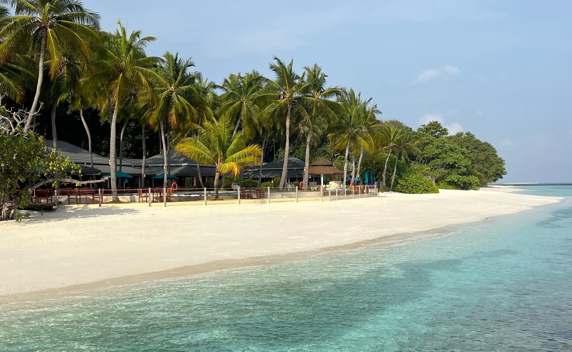 Sunny tropical beach and lagoon in the Maldives