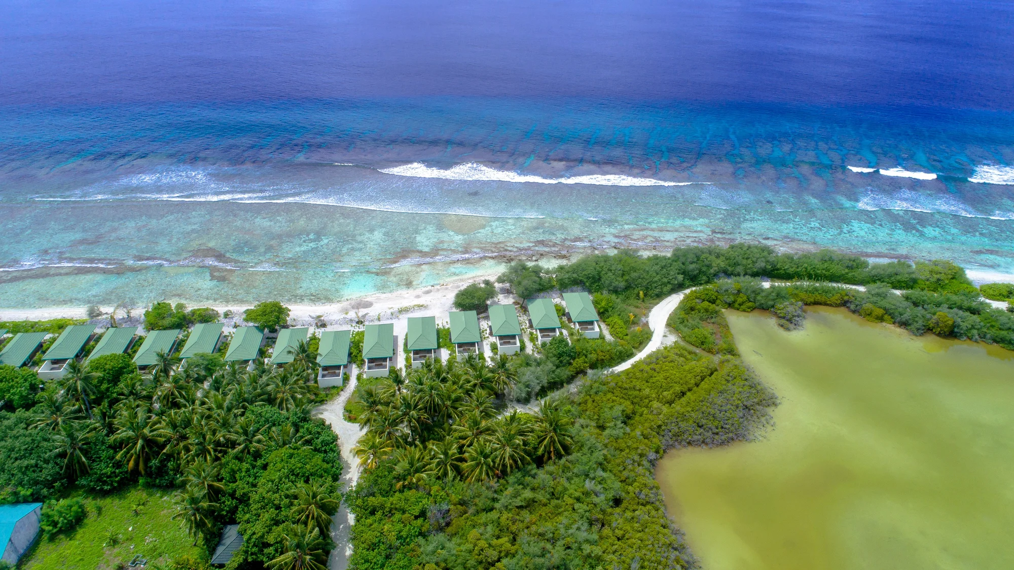 Aerial overview of a Maldivian island and lagoon