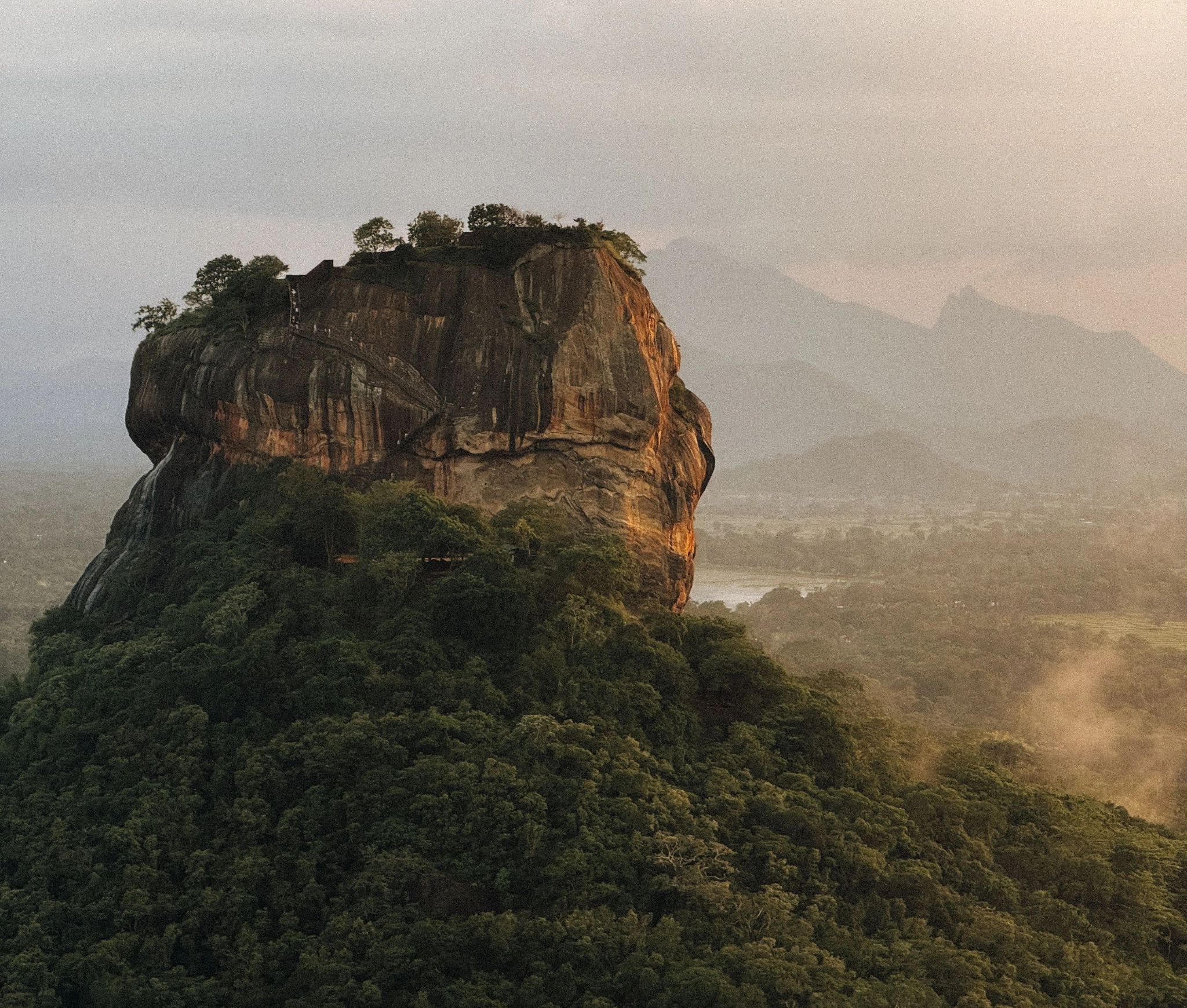 Sigiriya Rock Fortress rising above the surrounding forest in Sri Lanka