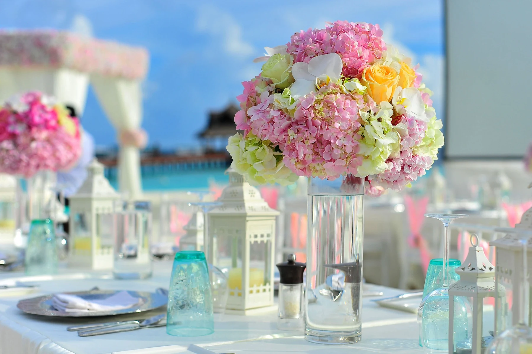 Elegant destination wedding table with floral centrepiece