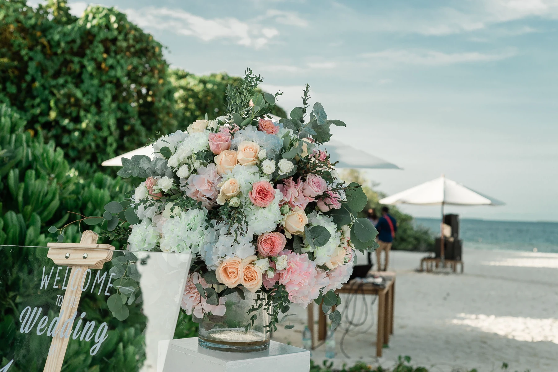 Romantic wedding reception decorated with flowers and lights